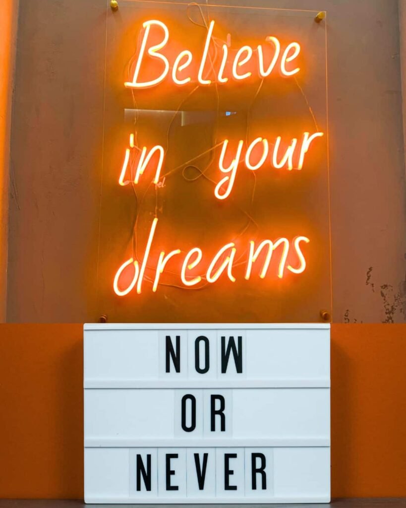 Motivational neon sign for staying in the new timeline after quantum jumping for love.