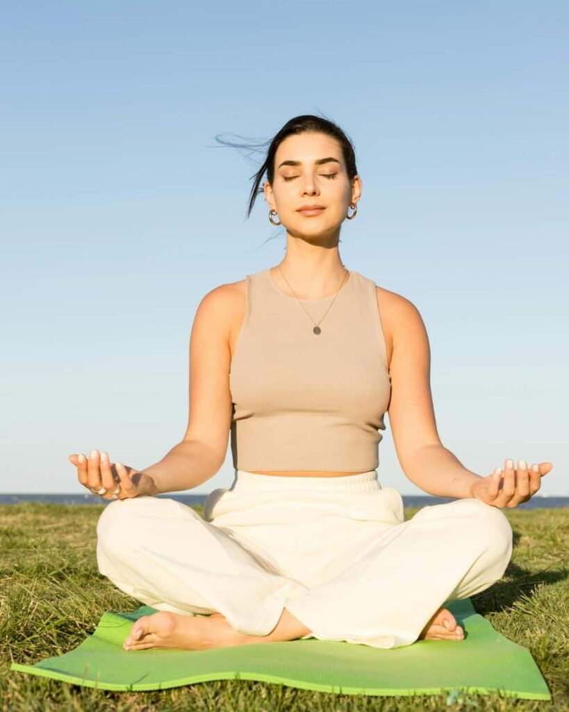 A woman in deep meditation rewiring her brain and nervous system for quantum jumping for love in 2026.