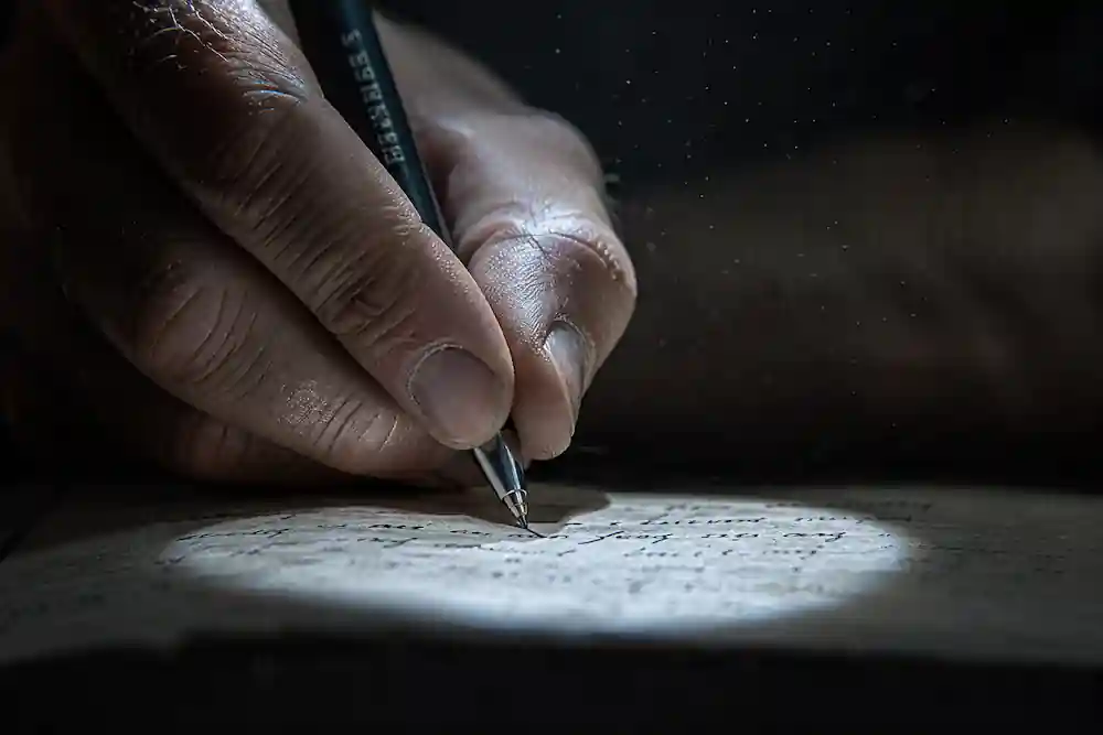 Hand-written notes for a debt detox manifestation ritual under the Full Moon in Scorpio May 2026.