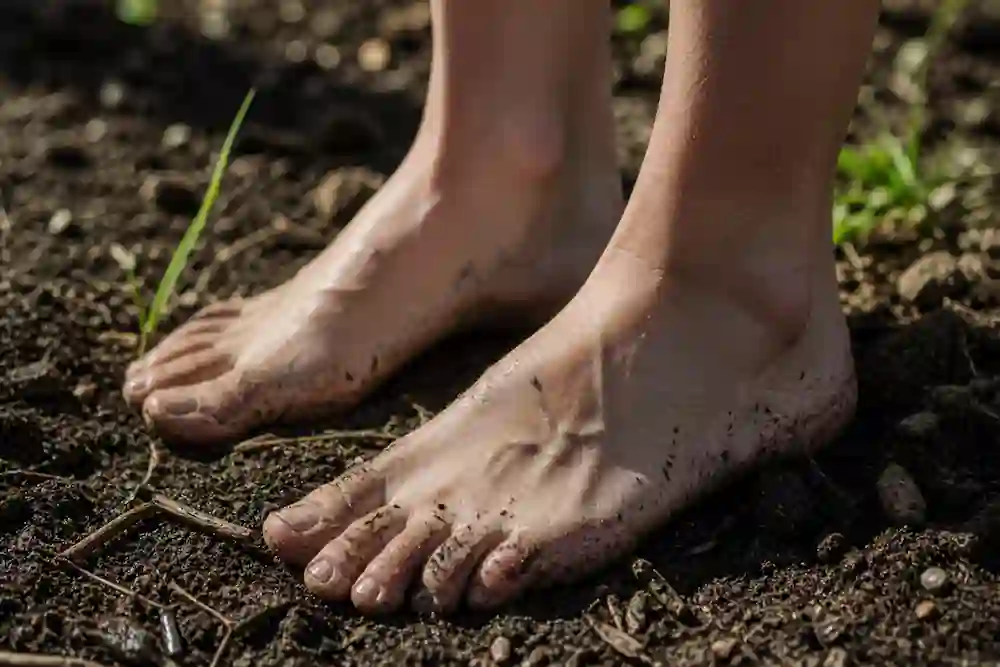 A raw, detailed photo of bare feet on damp, textured soil, representing Taurus New Moon grounding techniques during the 55 portal.